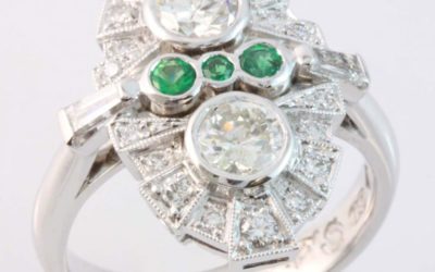 Hand crafted emerald and diamond ring