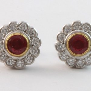 18 carat two tone ruby and diamond halo stud earrings