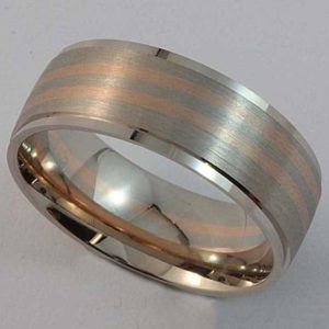 White and rose gold wedding ring with brushed finish detail
