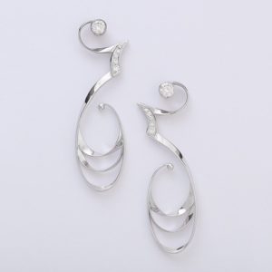 18 carat white gold hand crafted diamond earrings.