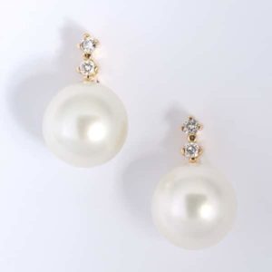 18 carat yellow gold South Sea pearl and diamond stud earrings.