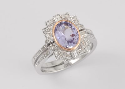 18 carat white and rose gold oval Tanzanite and diamond ring