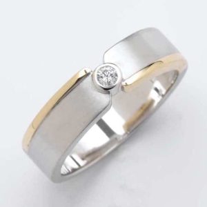 Two tone gents ring with a central bezel set diamond 0.08ct