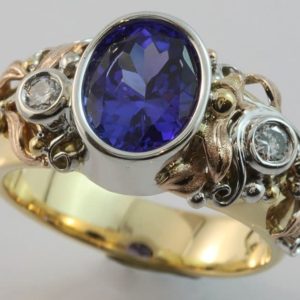 Tanzanite and diamond ring, oval Tanzanite ring, hand made Tanzanite ring, Abrecht Bird, Abrecht Bird Jewellers