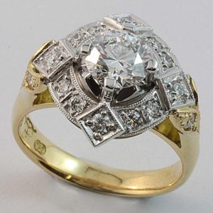 Art-Deco inspired 'Shield' cluster featuring pavé set details.