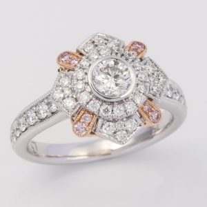 18 carat white and rose gold pink and white diamond ring.