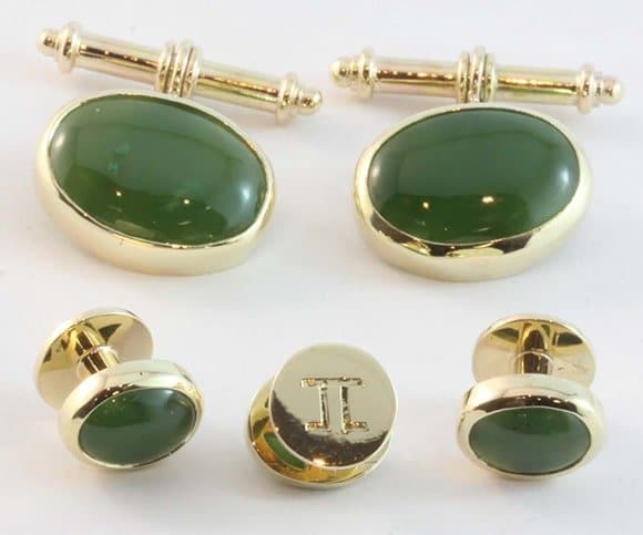 Matching cufflinks and dress studs made from yellow gold and jade