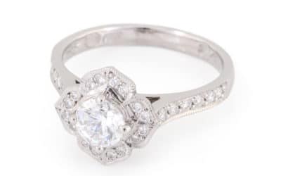 120308 : 18 Carat White Gold Diamond Halo Ring