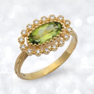 peridot, gold, diamond, diamond ring, oval peridot ring, peridot ring, Abrecht Bird Jewellers